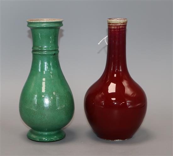 A Chinese sang de boeuf (langyao) vase and a Chinese green crackle glaze vase, 18th/19th century, Height 21cm